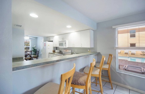Pelican Condo | Beautiful Family Sized Condo with Private Pool and Pier