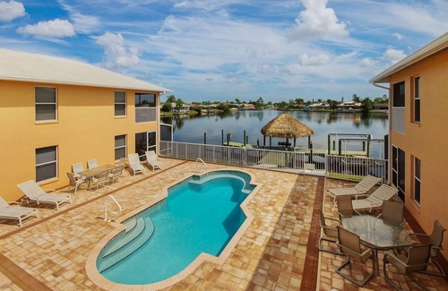 Pelican Condo | Beautiful Family Sized Condo with Private Pool and Pier