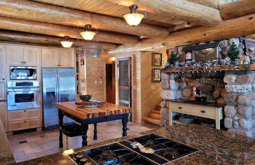 Tower House | Beautiful handmade log home on private sand beach at the end of Big Bay