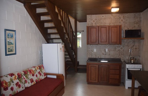 Praia do Rosa House | Beautiful hostel on Rosa's beach. Near the pond, market and parties!