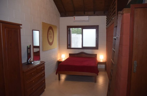 Praia do Rosa House | Beautiful hostel on Rosa's beach. Near the pond, market and parties!