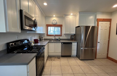 Silver Creek House | Beautiful Lake Front Home on Acre with Hot Tub & Private Dock