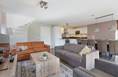 Ouddorp House | Beautiful luxury design holiday homes 2 minutes from the beach with large garden, Jacuzzi, porch and trampoline.