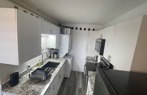 Estate Saint John Condo | Beautiful Newly-Renovated 1 BR North Shore Condo with Buck Island Views and Pool
