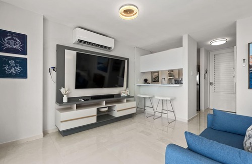 Vilomar Apartment | Beautiful Newly Remodeled Beachfront Apartment with Pool and Parking at Luquillo