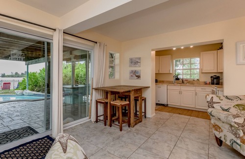 Grant-Valkaria Ski Chalet | Beautiful Riverfront Chalet w/Pool & Boat Dock- Old Florida Fun- Pet Friendly!