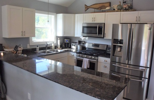 Carova Beach House | Beautiful Secluded Carova Beach House - Hot tub - Pet yard with access door