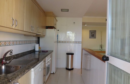 Oliva Apartment | Beautiful Stella apartment in 1st line on the sea with swimming pool, palm tree