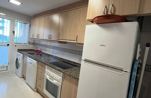 Oliva Apartment | Beautiful Stella apartment in 1st line on the sea with swimming pool, palm tree