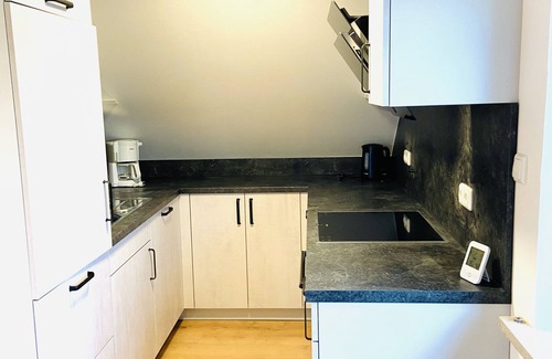 Haunstetten-Sud Apartment | Beautiful top floor apartment with loft character