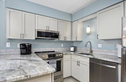 North Ocean City Condo | Beautiful, totally remodeled 1 bedroom, 2 full bathroom condo just steps to the beach!