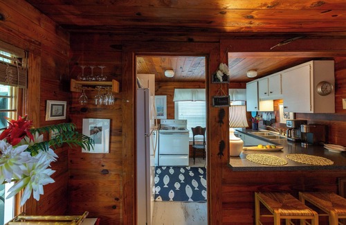 Minnesott Beach Cottage | Beautiful Waterfront Home W/Sleeping Porch on the Neuse River, outdoor shower.