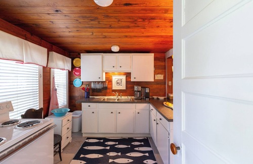 Minnesott Beach Cottage | Beautiful Waterfront Home W/Sleeping Porch on the Neuse River, outdoor shower.