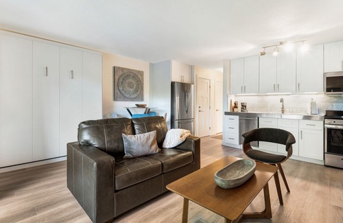 Orchard District Condo | Beautifully Remodeled top floor condo with two balconies, a fireplace and BBQ!