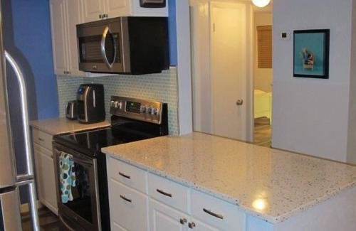 Ormond-by-the-Sea Condo | Beautifully Updated and Steps to the Beach - includes Wifi!