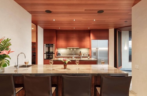 Kilauea House | Beauty and modernity meet in this standout oceanfront home perched above Secret Beach.