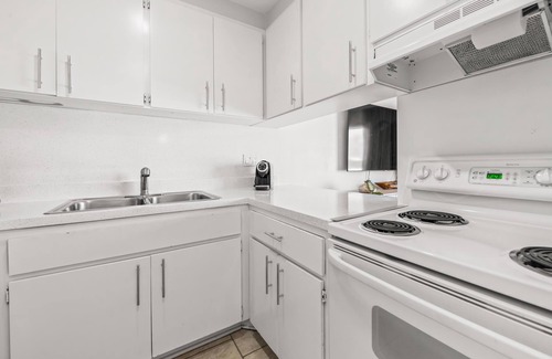 Holmes Beach Resort | BEDROOM TO BEACH IN 5 SECONDS FLAT in this 2 Bedroom 1 Bath Beachfront Suite at Bali Hai