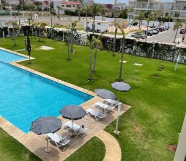 Sidi Rahal Apartment | Bel appartement pied sur mer vue imprenable sur piscine et jardins