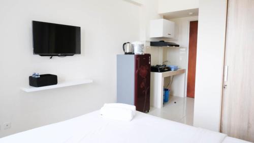 Surabaya Apartment | Best Choice and Cozy Stay Studio at Puncak Kertajaya Apartment By Travelio