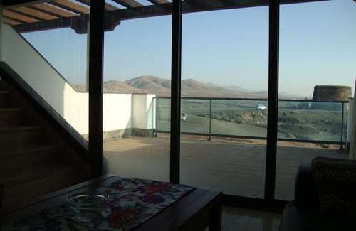 El Cotillo Apartment | Best location on 2 floors (with penthouse) directly by the sea. Dream view from 3 terraces