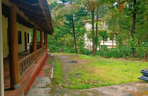 Kanbylu Baichanalli Apartment | Birds Valley Estate stay by dew Drops