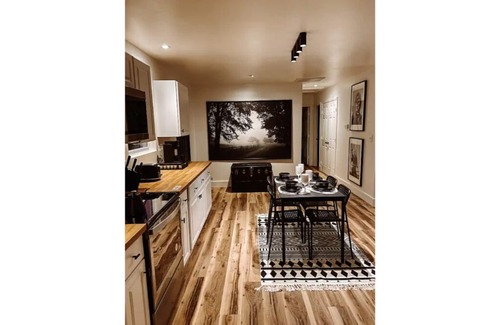 Matthews Cabin | Black and White Cabin on Tranquil Three Acres