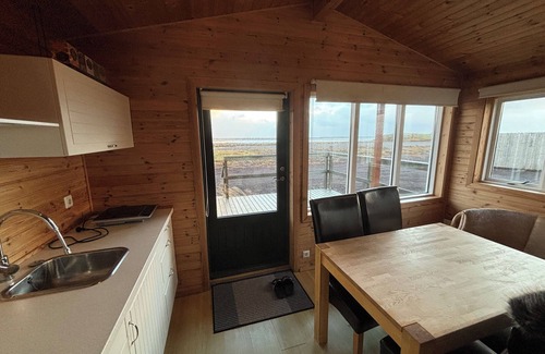Eyja- og Miklaholtshreppur Cabin | Black sand beachfront cabin with private hot tub