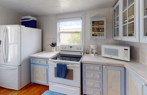 Blossom Village Villa | Blossom Village Cottage – Charming Beachfront Cottage by Cayman Villas.