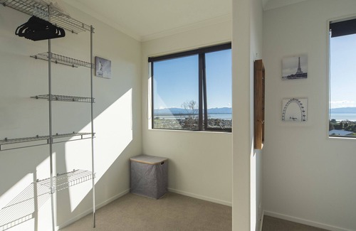 Tahunanui House | Blue Water Views - Modern, Sun-filled & Offers Fantastic Views over Tasman Bay.