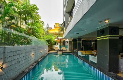 Candolim Apartment | BluO 1BHK - Shared Pool, Candolim Beach 800m