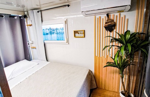 Porto Levante Boat Rental | Boathouse "Floating Home Delta del Po" with Terrace, Whirlpool & Wi-Fi