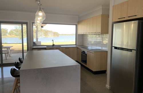 Kirwans Bridge House | Bobby's is a large new family home with water frontage.