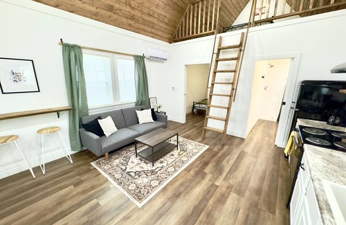 Albertville Cabin | Bobcat Tiny Luxury Cabin on Lake with Inflatables