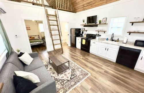 Albertville Cabin | Bobcat Tiny Luxury Cabin on Lake with Inflatables