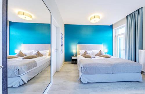 Ostseebad Wustrow Apartment | Boddenzeit - Moderne Ferienwohnung mit Nordbalkon, Wellnessbereich und Nähe zum Ostseestrand