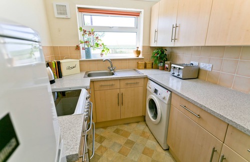 Ty Croes Apartment | Bodwarren - a ground floor bedroom that sleeps 4 guests in 2 bedrooms