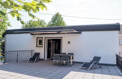 Hennef Apartment | Bonquartier | Modern apartment with workspaces, terrace & parking space