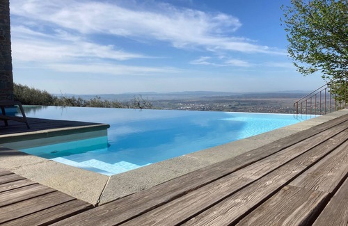 Giugnano Villa | Borgo in Montalbano by Secret Hills, villa with waterfall pool with view