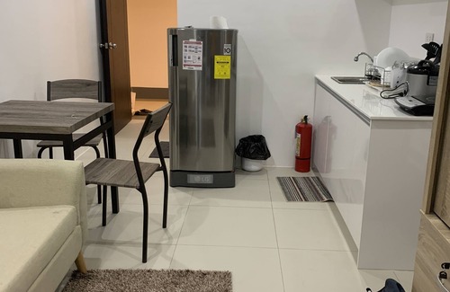 Cagayan de Oro House | Brand New Condo with pool and gym. One minute walk from Mall