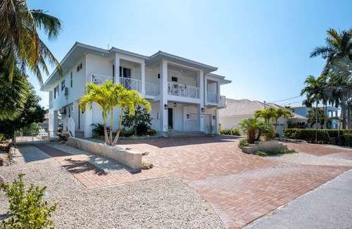 Coury House | Brand new luxury home with private pool & dock