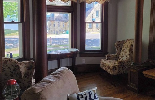 Guttenberg House | Breathtaking house steps from the river with incredible 1890s woodwork & floors