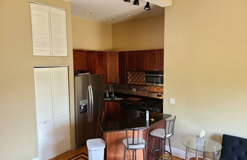 Grand Boulevard Condo | Bright 2 Bed/2 Bath Condo With Patio Less Than 10 Mins From Major Attractions