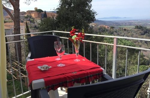 Gavorrano Apartment | Bright apartment with beautiful sea view and 50 m2 rooftop terrace,