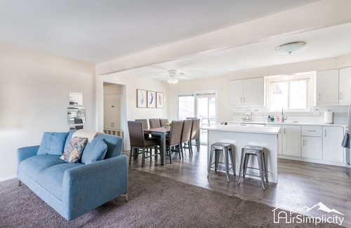 Wheat Ridge Apartment | Bright & Chic Getaway Game Room Covered Deck