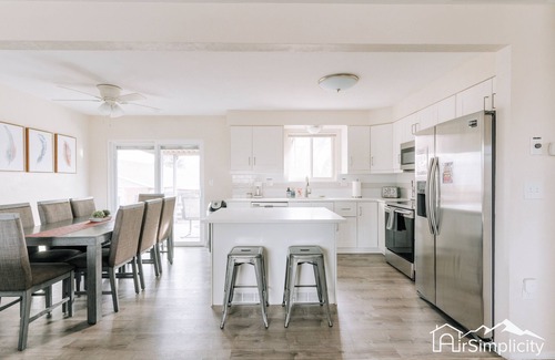 Wheat Ridge Apartment | Bright & Chic Getaway Game Room Covered Deck