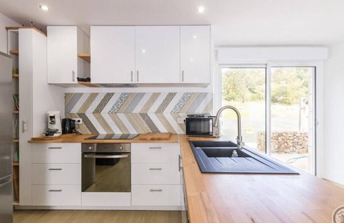 Tollevast Cottage | Bright family home with spa, private garden and children's games.