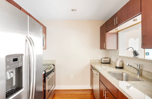 George Washington University Apartment | Bright Foggy Bottom 1BR w/W/D, Pool & Gym, nr Georgetown, by Blueground