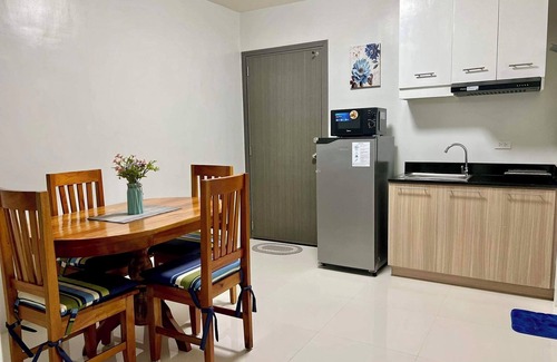 Puerto Princesa City Centre Condo | Bright Minimalist Condo with Netflix