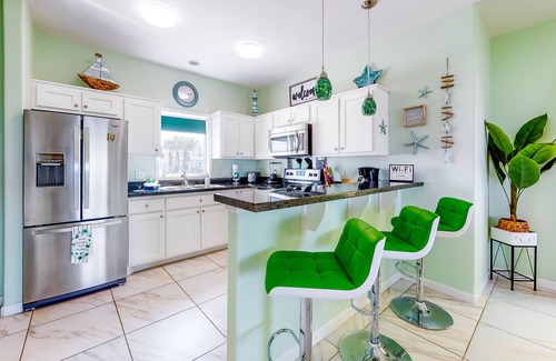 Port Isabel House | Bright Waterfront Home with Shared Pool, Water View, and High-Speed WiFi