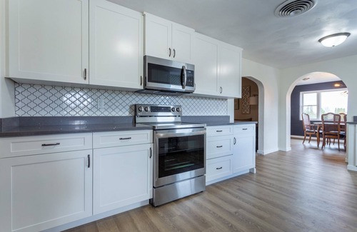 Dyersville House | Bring the whole family to this great home with an acre of room for fun.